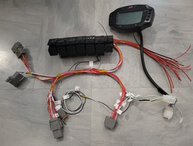 This club spec relay / fuse harness is almost finished (needs a couple of connectors, wrapping and testing) and then will be ready for fitting to a lovely Hillclimb / Sprint Clio. I'm not sure about the 2.8mm multipin connector for the dash but that's what it came with! It'll be OK for testing but maybe I'll swap in a Deutsch DTM for that.